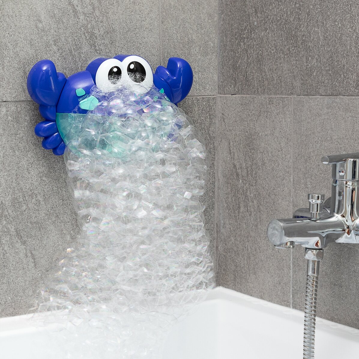 Giocattolo da bagno - granchio musicale con diffusore di palloncini