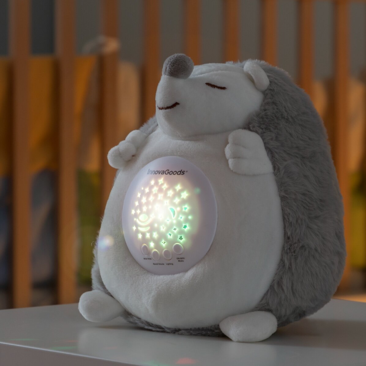 Giocattolo di peluche a forma di riccio con proiettore di luci e suoni