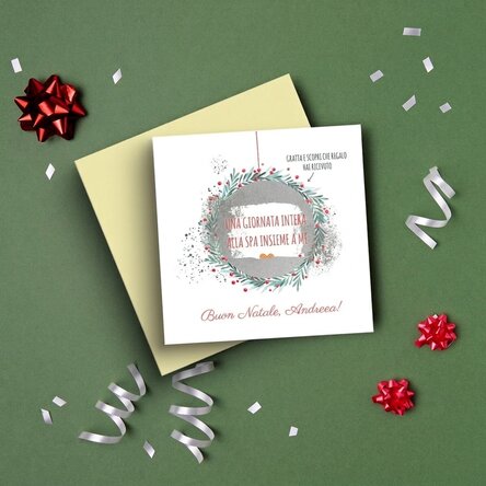 Cartolina gratta e vinci personalizzata con un messaggio a sorpresa di Natale