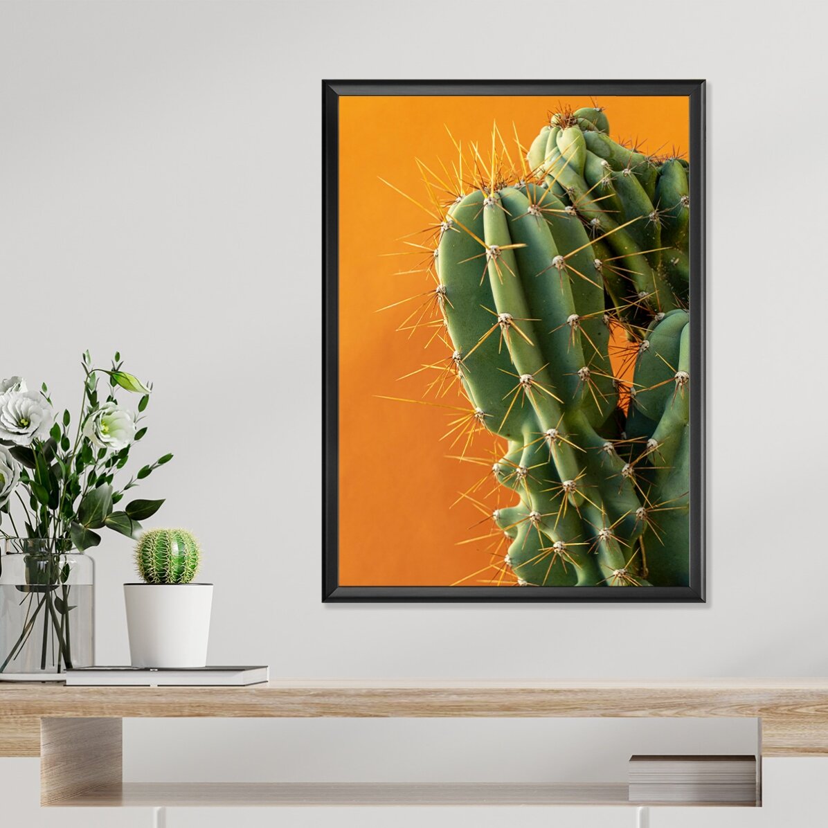 Poster con cactus su sfondo colorato