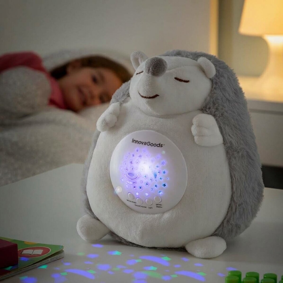 Giocattolo di peluche a forma di riccio con proiettore di luci e suoni