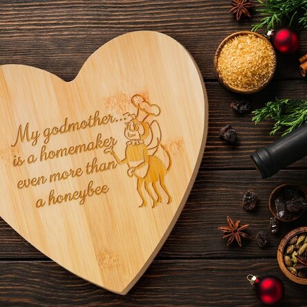 Heart-shaped chopping board personalised with a message for Nasa