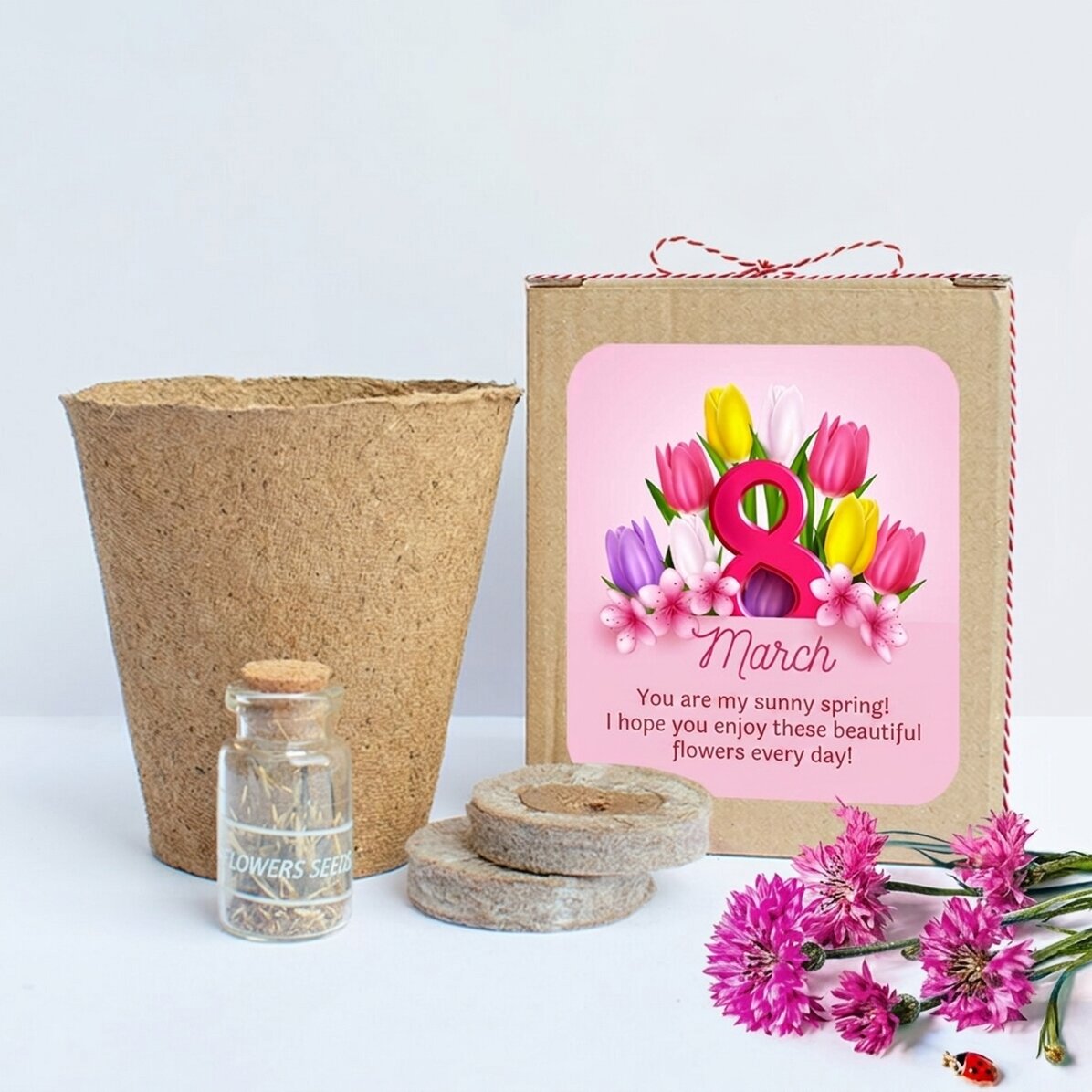 Kit per piantare fiori primaverili in una scatolina personalizzata con un messaggio per l