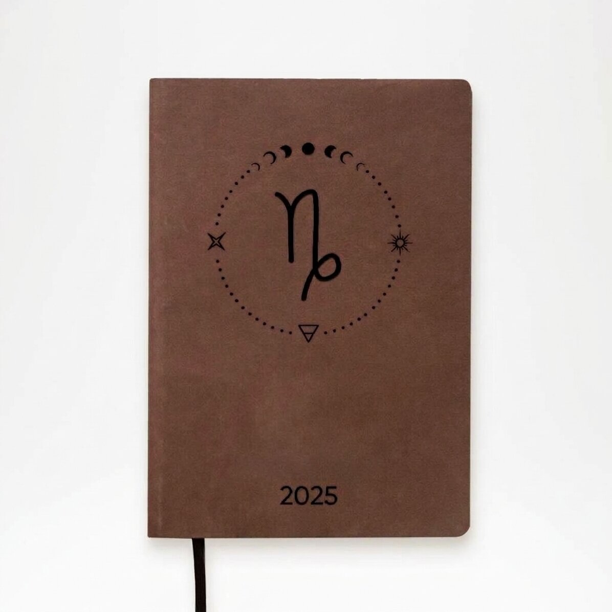 Agenda in pelle personalizzata con testo e segno zodiacale del Capricorno